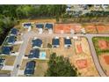 New homes and vacant lots are visible in this aerial view of a quiet residential community at 237 Ivey Ter # 41, Temple, GA 30179