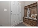 Welcoming entryway with coat rack and storage bench at 2851 Fareed St, Douglasville, GA 30135