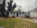 Charming single-story home featuring a well-maintained lawn and classic curb appeal at 192 Margaret St, Fairburn, GA 30213