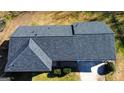 An aerial view shows the roof of the home and the surrounding property at 6268 Mount Zion Blvd, Morrow, GA 30260