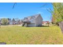 Expansive backyard with wooden deck, ideal for outdoor entertaining or Gathering gatherings at 1515 Summer Lake Ter, Loganville, GA 30052