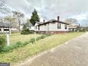 Charming home with traditional architectural details and a cozy backyard at 45 Poplar St, Porterdale, GA 30014