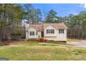 Inviting single-Gathering home with a manicured lawn and classic design elements at 370 Burton Dr, Douglasville, GA 30134