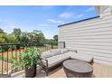 Relaxing outdoor balcony with comfortable seating and a view at 2581 Astaire Ct, Atlanta, GA 30318