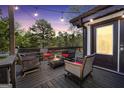 Inviting outdoor space with cozy seating around a fire pit, perfect for relaxing and entertaining at 509 Eskew Rd, Mcdonough, GA 30252
