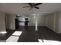 Spacious open-concept layout connecting the living area and kitchen at 3122 Latona Sw Dr, Atlanta, GA 30354