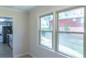 Bright interior shot with large windows and view of the backyard and modern appliances at 2282 Tiffany Ct, Jonesboro, GA 30236