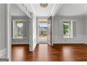 Inviting entryway with hardwood floors and view of the home's exterior at 1301 Blue Sky Ct, Peachtree City, GA 30269