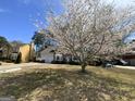 Two story home with a brick facade and light siding at 645 Legend Sw Ct, Atlanta, GA 30331
