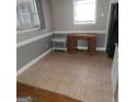 Bright dining room with tile floors and space for a desk or dining set at 2563 Highway 81 E, Mcdonough, GA 30252