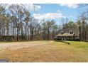 Spacious lot with a charming home at 375 Wellington Mill Rd, Whitesburg, GA 30185