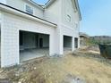 Spacious three-car garage with plenty of room for vehicles and storage at 138 Silvercrest Dr # 169, Acworth, GA 30101