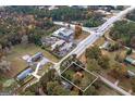 Aerial view showcasing the property's location near highways and a mix of commercial and residential areas at 111 Highway 138 E, Stockbridge, GA 30281