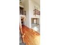 Spacious foyer with hardwood floors and an open view of the living and dining area at 3626 Lone Indian Trl, Marietta, GA 30066