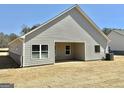 Back view of home featuring an open porch area and large windows, great for natural light at 553 Cantrell Drive, Dallas, GA 30157