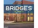 The Bridges at Jodeco building with modern architecture and well-maintained landscaping at 328 Wandering Brook Dr # 39, Mcdonough, GA 30253