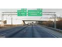 Highway sign displaying exits for Jodeco Road, Jonesboro Road, and Lovejoy at 328 Wandering Brook Dr # 39, Mcdonough, GA 30253