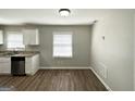 Bright kitchen with modern appliances, granite countertops, and ample cabinet space at 2566 Nw Santa Barbara Dr, Atlanta, GA 30318