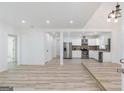 Bright open concept living room flowing into a modern kitchen at 1101 Oak Knoll Ter, Atlanta, GA 30315