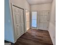 Welcoming foyer with hardwood floors and ample closet space, perfect for organization and storage at 116 Glendale Dr, Peachtree City, GA 30269