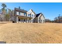 Beautiful two-story home with gray siding and a spacious yard, perfect for outdoor activities and relaxation at 279 Deer Creek Run # 4, Moreland, GA 30259