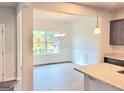Dining room features wainscoting and natural light from large windows at 4841 Walkers Green, Mableton, GA 30126