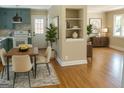 Inviting dining area adjacent to the kitchen, with a wooden table and contemporary chairs at 2502 Miriam Ln, Decatur, GA 30032