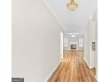Inviting home featuring hardwood floors and a direct view of the living room fireplace at 161 Spring Creek Blvd, Mcdonough, GA 30253
