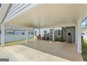 Spacious covered parking area perfect for entertaining with ample room for seating at 5124 N Pratt St, Covington, GA 30014