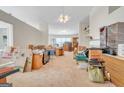 Bright living area featuring neutral walls, carpet flooring, and ample space to relax and entertain at 2636 General Lee Ct, Buford, GA 30519