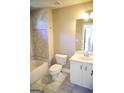 Bathroom features a tub and shower combination and traditional vanity at 65 Lotus Ln, Covington, GA 30016