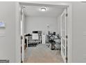 Bright office space with French doors, ideal for remote work or a home study at 517 Daffodil Ln, Mcdonough, GA 30253