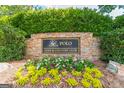 Stone sign and landscaping for Polo Golf & Country Club at 7415 Northampton Ct, Cumming, GA 30040