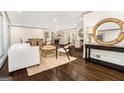 Bright and airy living room featuring hardwood floors, contemporary furnishings, and an open floor plan at 2695 Peeler Rd, Doraville, GA 30360