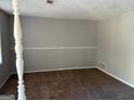 Cozy living room with neutral carpet and walls, creating a welcoming atmosphere at 5575 Marbut Rd, Lithonia, GA 30058