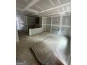 Unfinished living area with drywall installed, awaiting final touches and personalization in new home at 543 Courthouse Park Dr., Temple, GA 30179