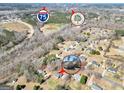 A captivating aerial shot situates the property near I-75 and amenities within the city of Locust Grove, Georgia at 321 Harris Ave, Locust Grove, GA 30248