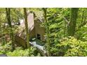 Backyard deck provides an inviting outdoor space with nature views at 2451 Cedar Fork Trl, Marietta, GA 30062