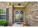 Close-up of the welcoming double-door entrance with seasonal wreaths at 4360 Derrick Rd, South Fulton, GA 30349