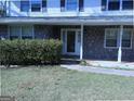 Close up of the front of the house with stone details and an inviting entrance at 30 Hickory Dr, Stockbridge, GA 30281