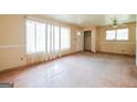 Bright, spacious living room with large windows providing ample natural light at 2595 Bonnybrook Sw Dr, Atlanta, GA 30311