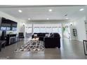 Spacious living room with hardwood floors, recessed lighting, and a modern design at 20 Rosser Rd, Mcdonough, GA 30252