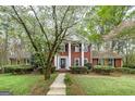 Charming two-story home with classic architectural design and a beautiful walkway at 173 Darwish Dr, Mcdonough, GA 30252