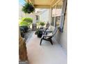Inviting front porch featuring stone pillars and comfortable seating for relaxing outdoors at 108 Stonecrest Dr, Carrollton, GA 30116