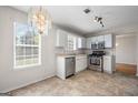 Functional kitchen with stainless steel appliances and natural lighting at 2550 Columbia Crossing Ct, Decatur, GA 30034