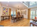 Elegant dining room featuring hardwood floors, chandelier lighting and windows with great views at 230 Haynes Rd, Moreland, GA 30259