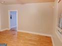 Living room with hardwood floors, natural light, and neutral walls at 674 Jett Nw St, Atlanta, GA 30318