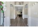 Spacious foyer with hardwood floors and elegant archways leading to the living areas at 634 Gardner Rd, Stockbridge, GA 30281