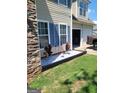 Landscaped exterior features lovely stone accents, white gravel, and stylish potted plants at 1055 Field View Dr, Mcdonough, GA 30253