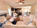 Open-concept living room flowing into the kitchen and dining area at 328 Trulove Lane Lot 32 # 32, Locust Grove, GA 30248
